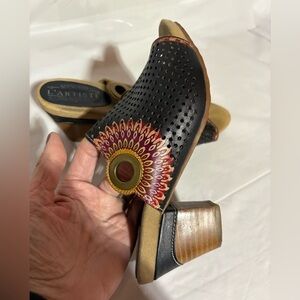 L'Artiste Black Perforated Leather Mule with Red Sunburst Accent